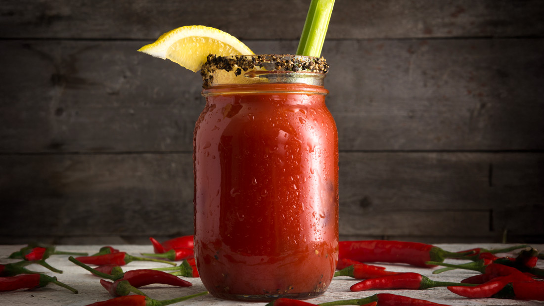 Bloody Mary Cocktail with Celery and Lemon Wedge