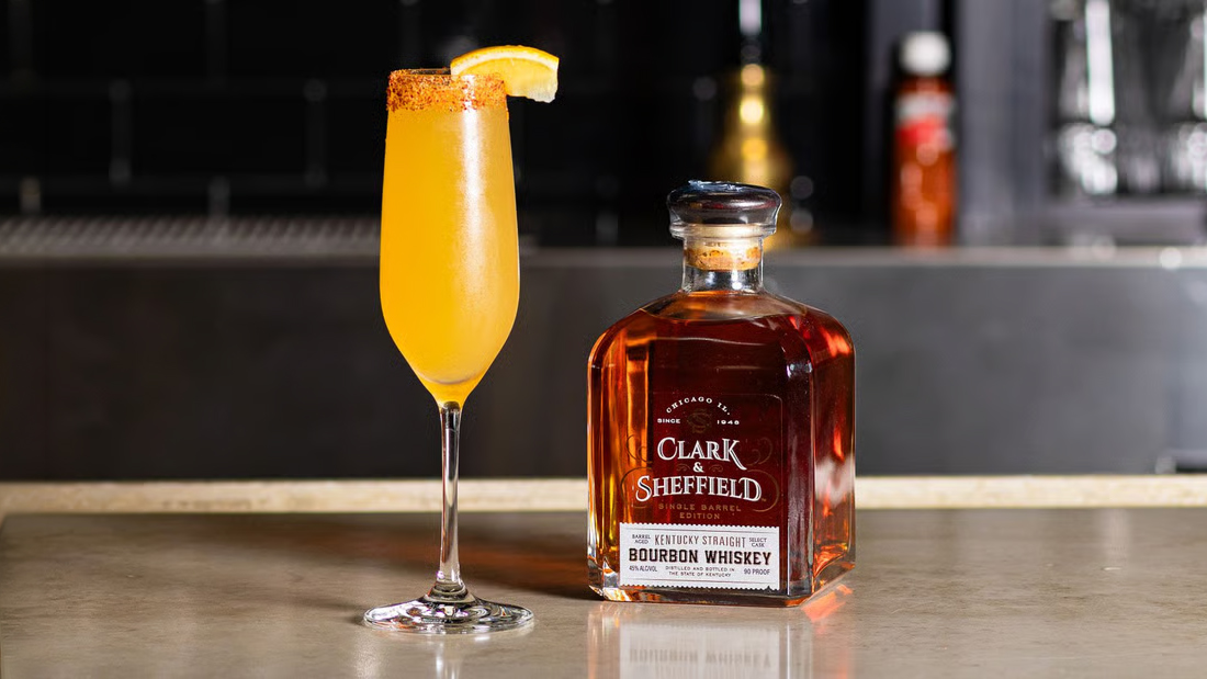 Bourbon Bellini Sparkling Cocktail in a Champagne Glass