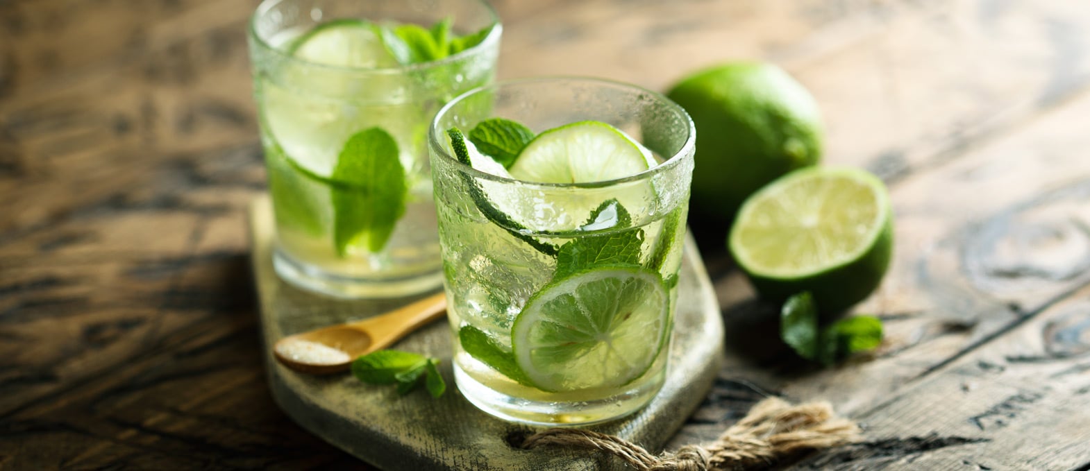 Two Rum Mojito Cocktails with Lime and Mint