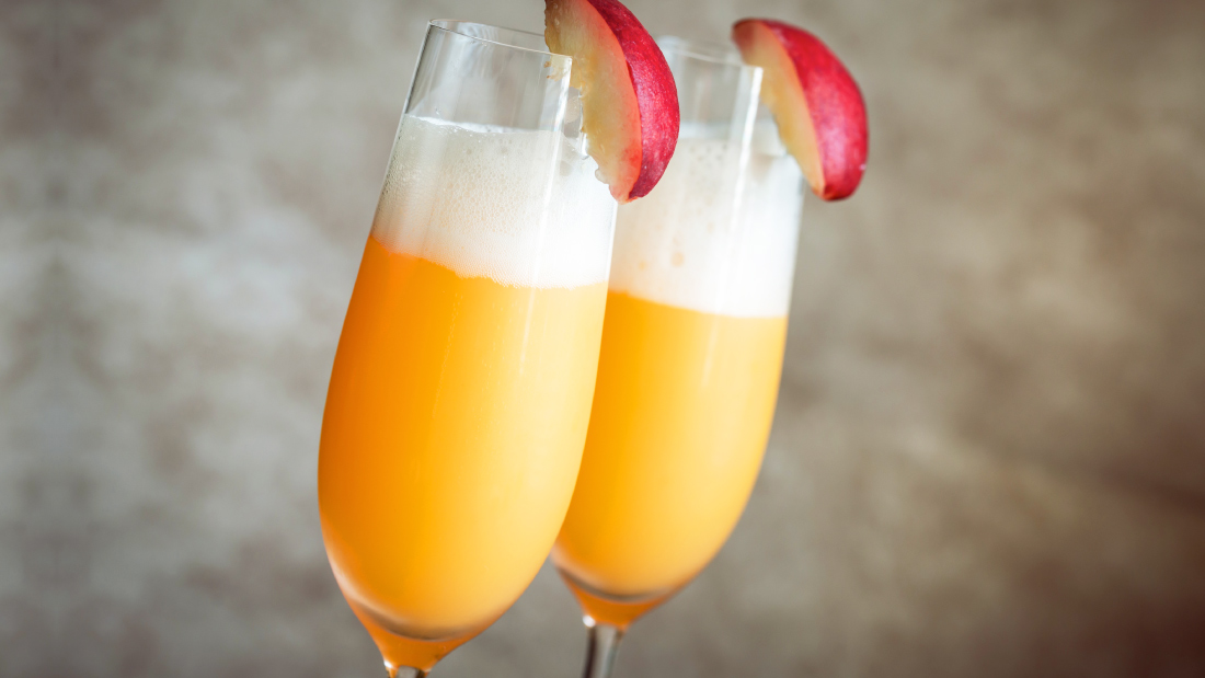 Sparkling Peach Bellini Cocktails with Strawberry