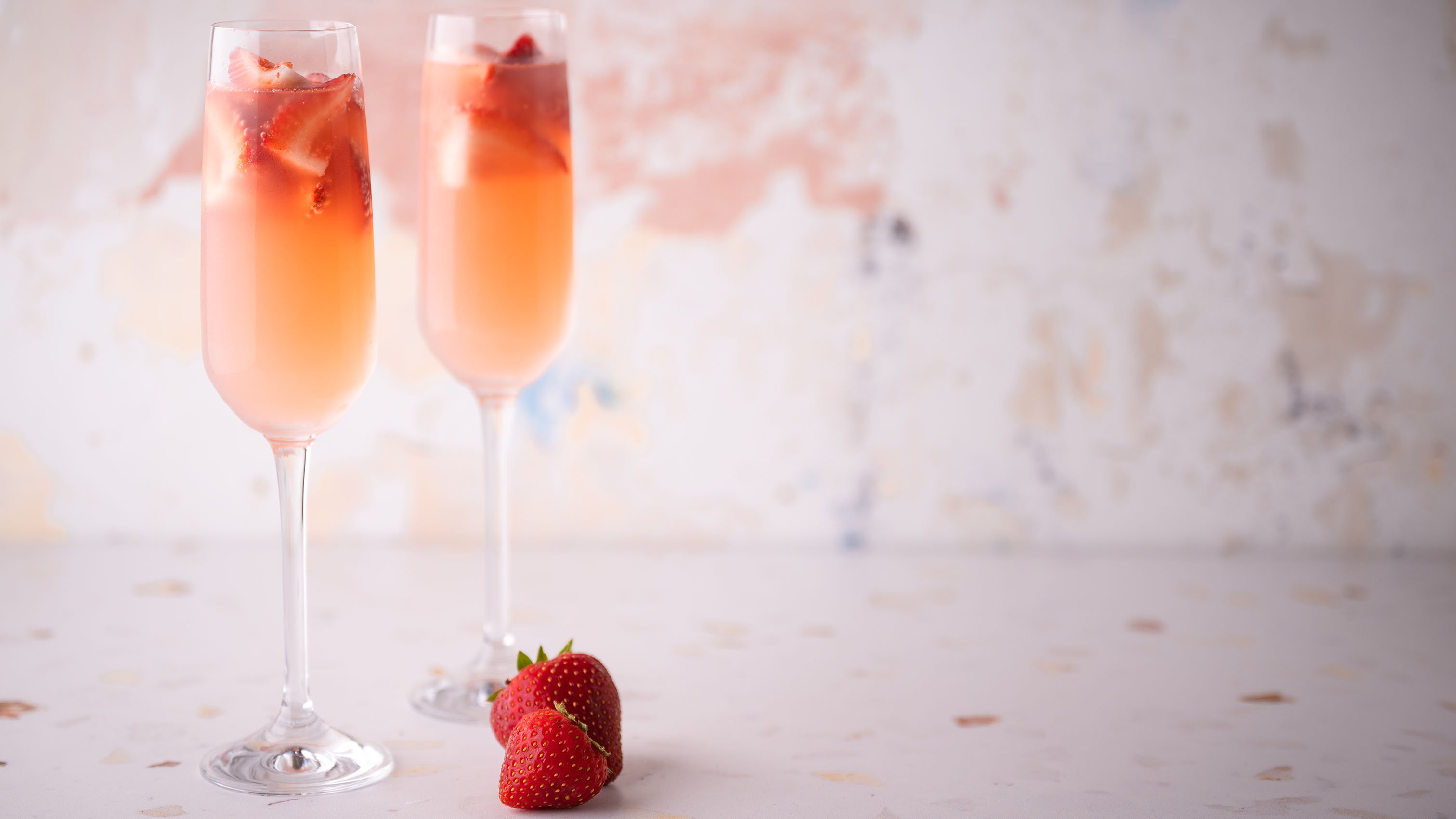 The heavenly cocktail recipe riff on the French 75 with fresh strawberry slices.
